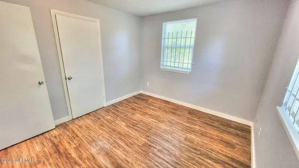 a view of a room that has a window in it