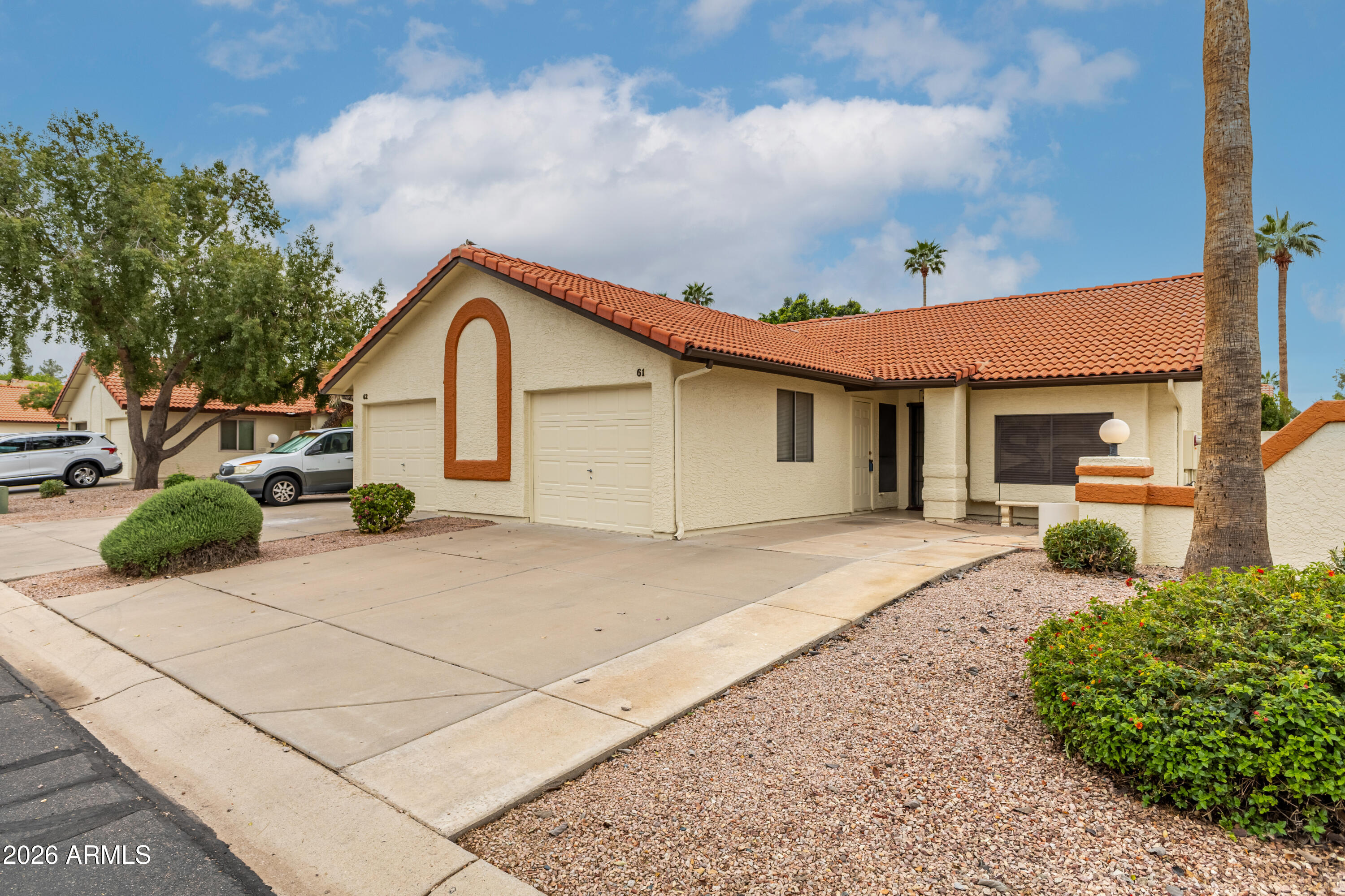 542 South Higley Road, Unit 61 Mesa, AZ 85206 - Photo 2 of 33 a house view with a outdoor space