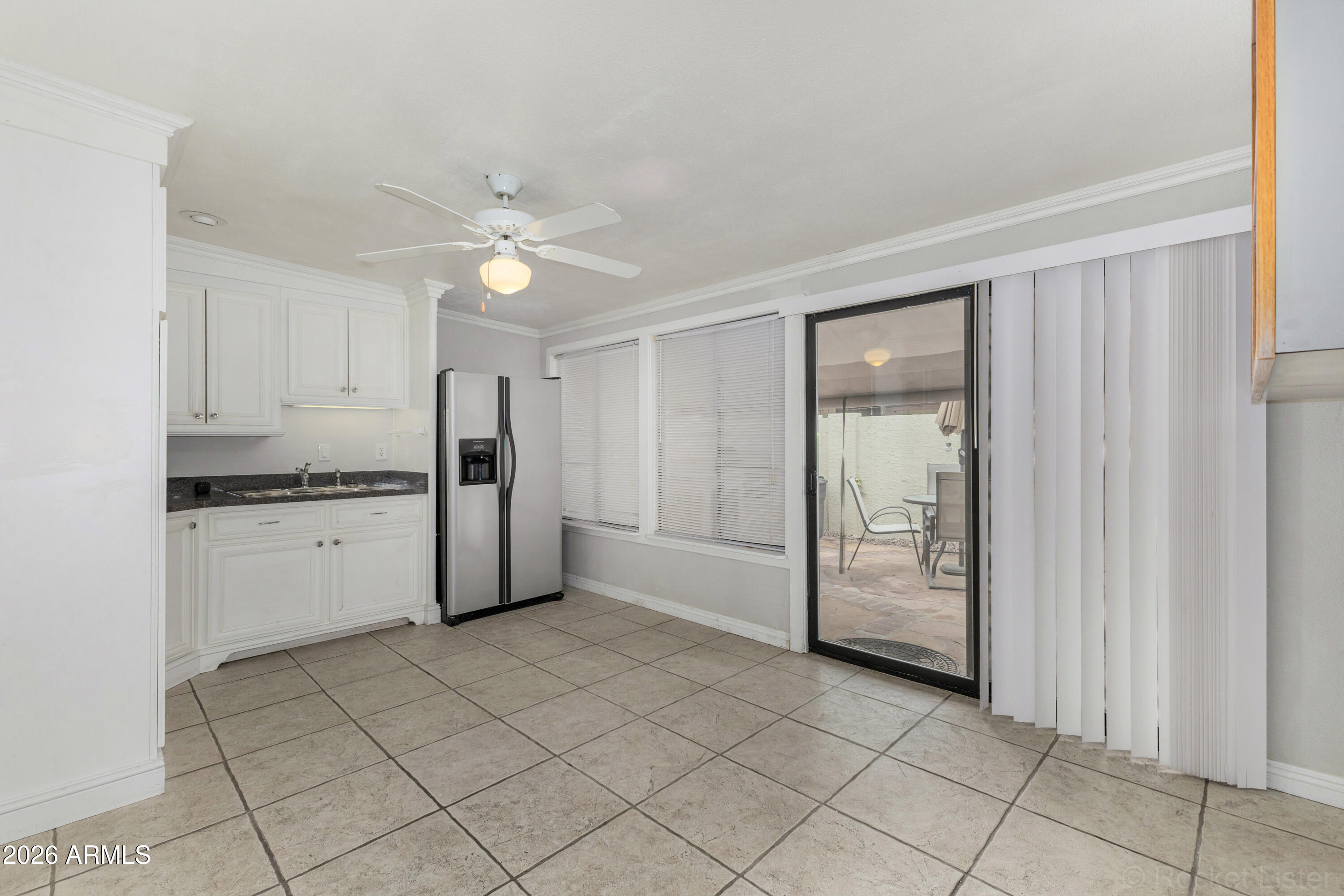 542 South Higley Road, Unit 61 Mesa, AZ 85206 - Photo 23 of 33 a view of a kitchen with a sink and a refrigerator