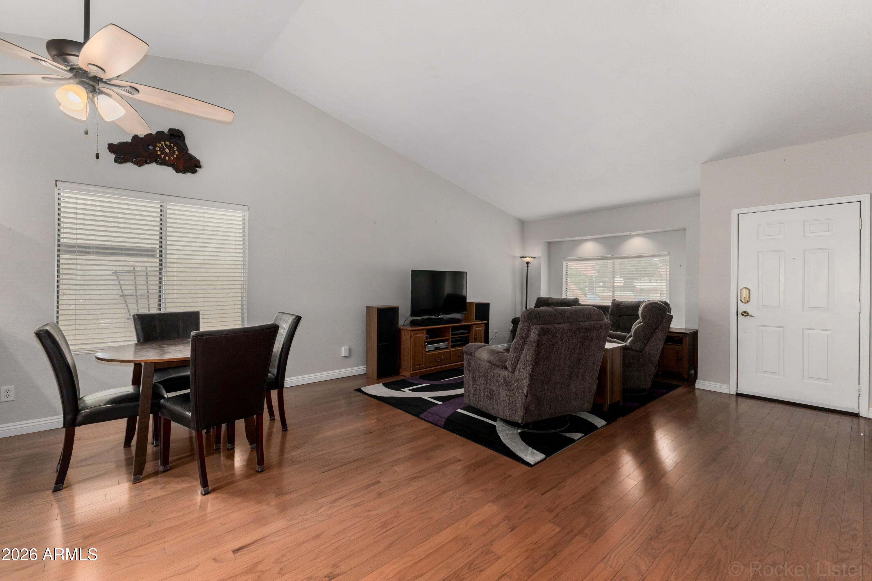542 South Higley Road, Unit 61 Mesa, AZ 85206 - Photo 5 of 33 a living room with furniture and a flat screen tv