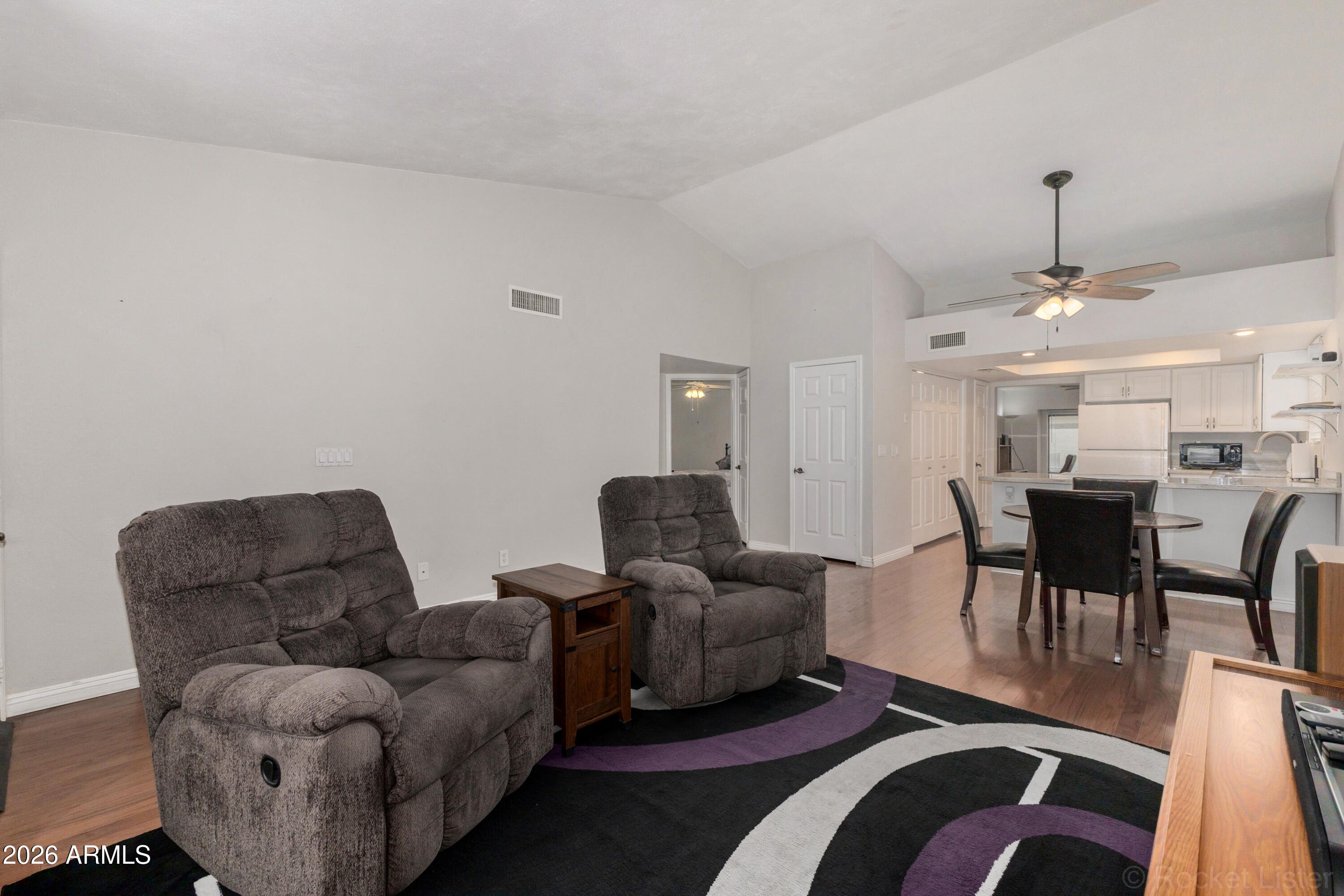 542 South Higley Road, Unit 61 Mesa, AZ 85206 - Photo 6 of 33 a living room with furniture and wooden floor