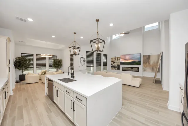 a kitchen with counter top space and stainless steel appliances