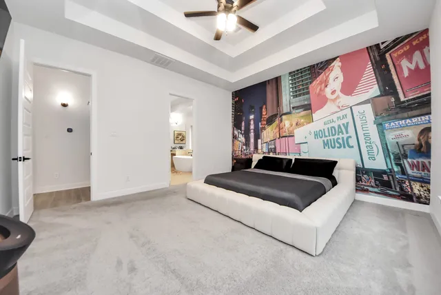 a spacious bathroom with a bathtub and sink