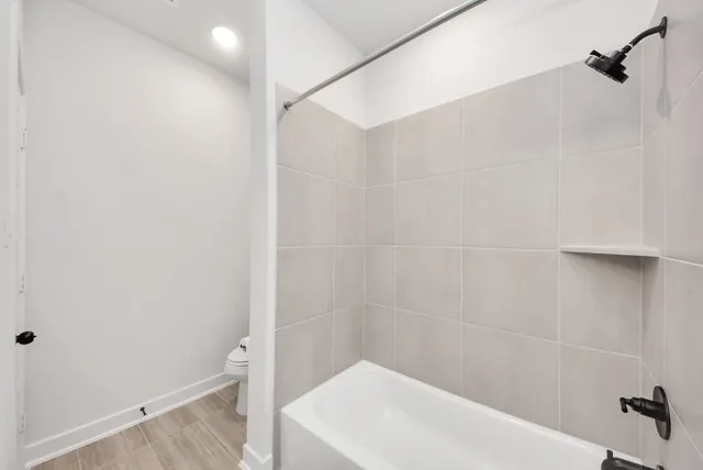 a view of workspace with wooden floor