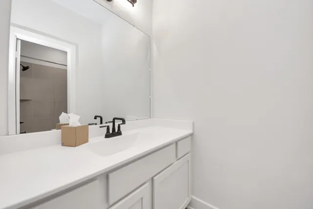 a room with gym equipment and windows