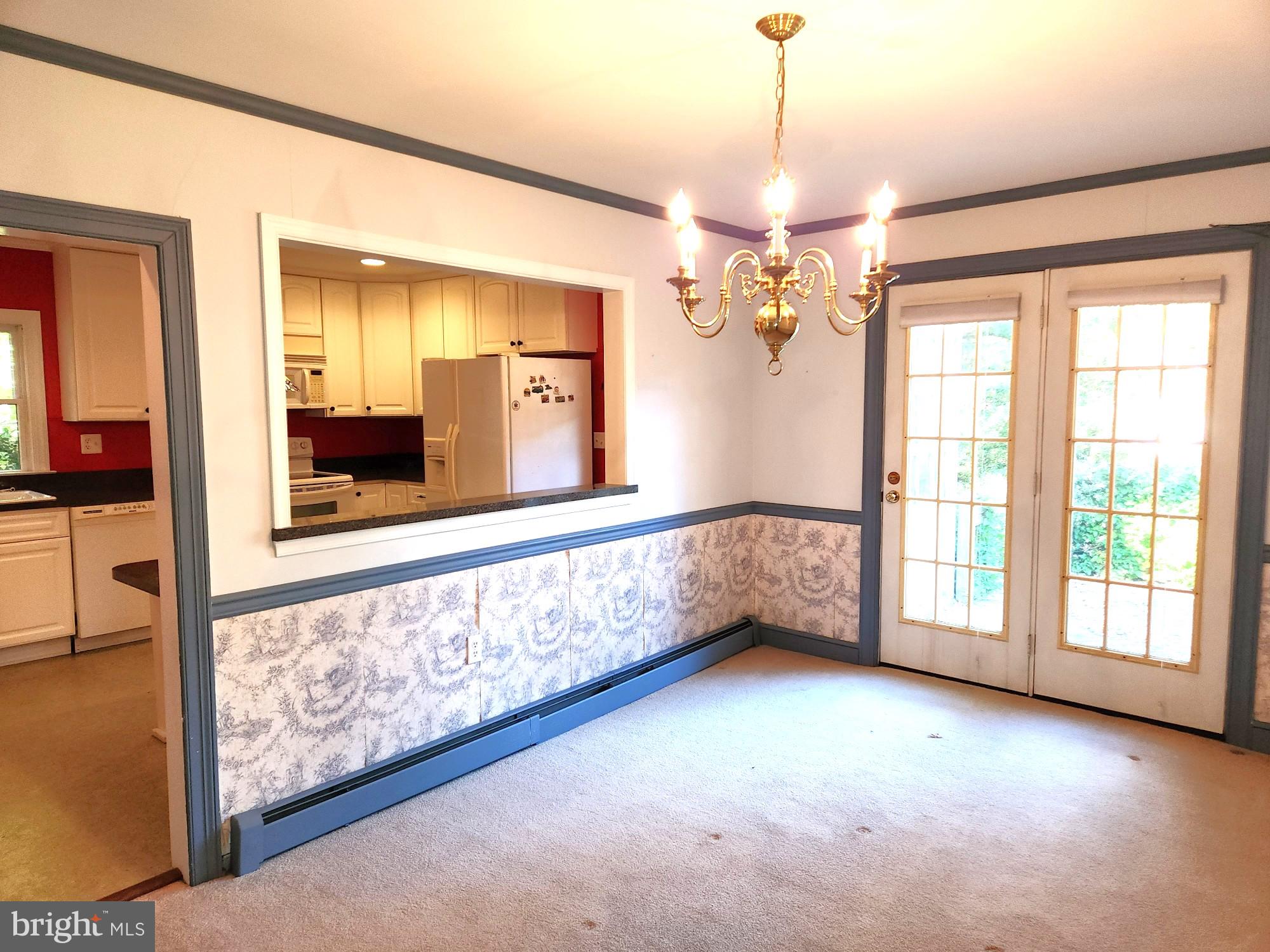 28538 Edgemere Road Easton, MD 21601 - Photo 14 of 27 Dining Room open to Kitchen and access to deck