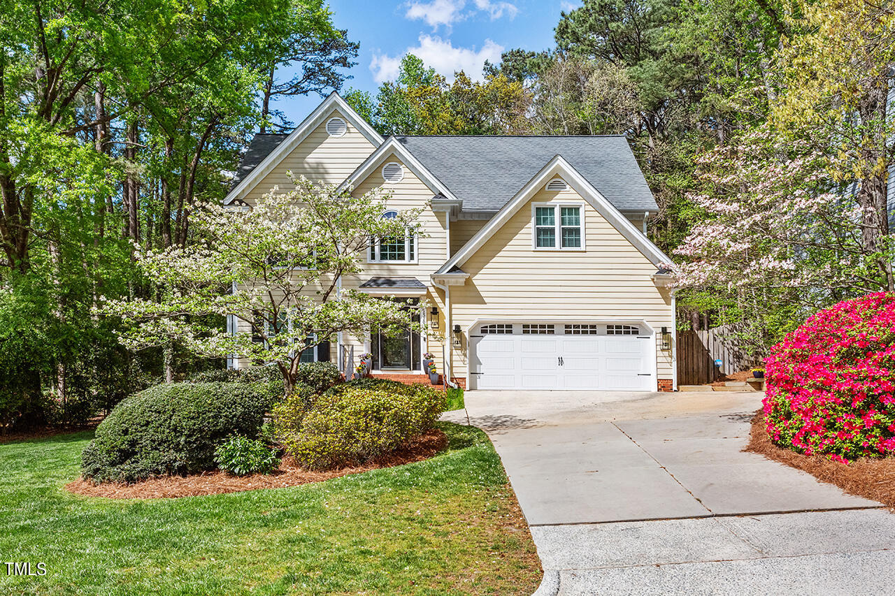 2520 Harptree Court Raleigh, NC 27613 - Photo 50 of 69 a view of a house with a yard and potted plants