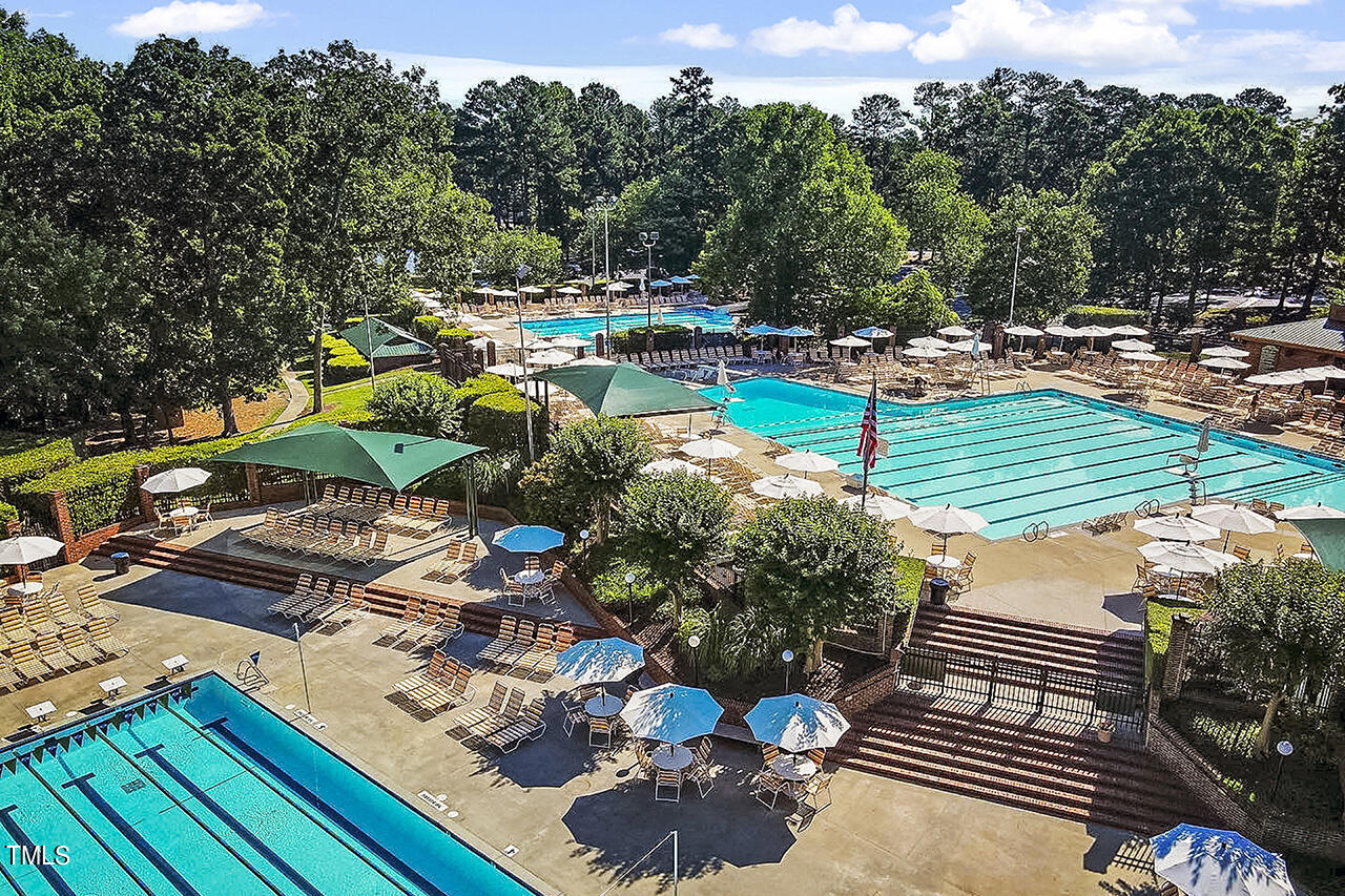 2520 Harptree Court Raleigh, NC 27613 - Photo 57 of 69 a view of a swimming pool with a patio and a yard