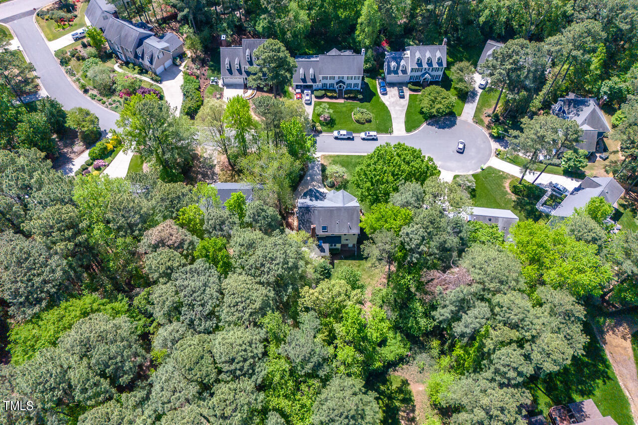 2520 Harptree Court Raleigh, NC 27613 - Photo 62 of 69 an aerial view of residential house with outdoor space and trees all around