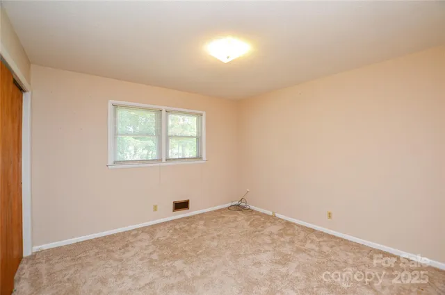 an empty room with a window