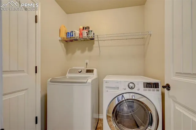 a room with pool table and furniture