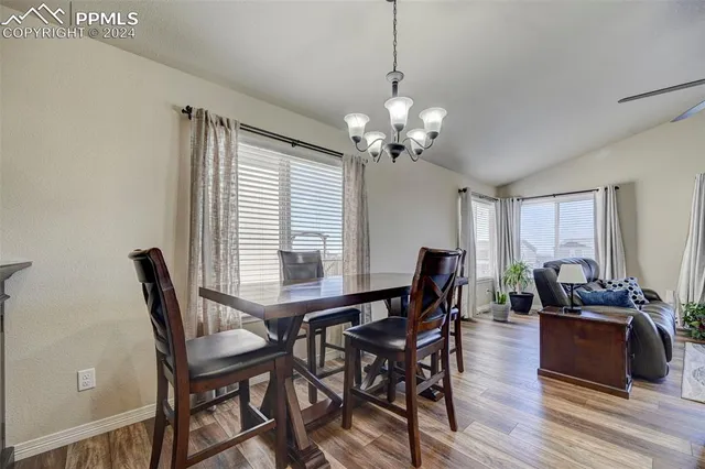 a living room with furniture fireplace and a flat screen tv