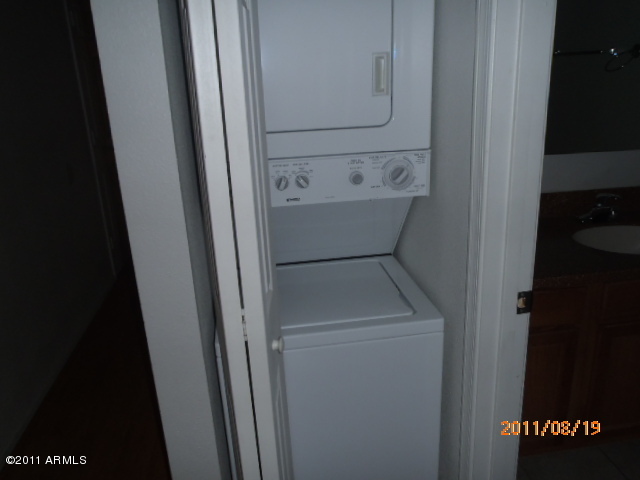 424 West Brown Road, Unit 106 Mesa, AZ 85201 - Photo 12 of 17 a utility room with dryer and washer