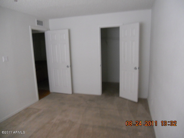 424 West Brown Road, Unit 106 Mesa, AZ 85201 - Photo 3 of 17 a view of an empty room