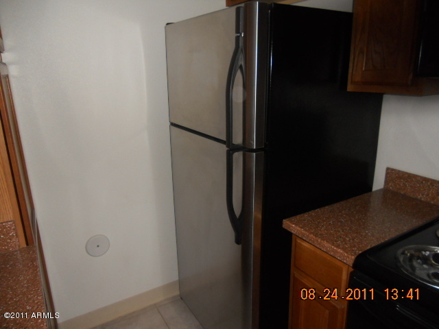 424 West Brown Road, Unit 106 Mesa, AZ 85201 - Photo 9 of 17 a close view of cabinet