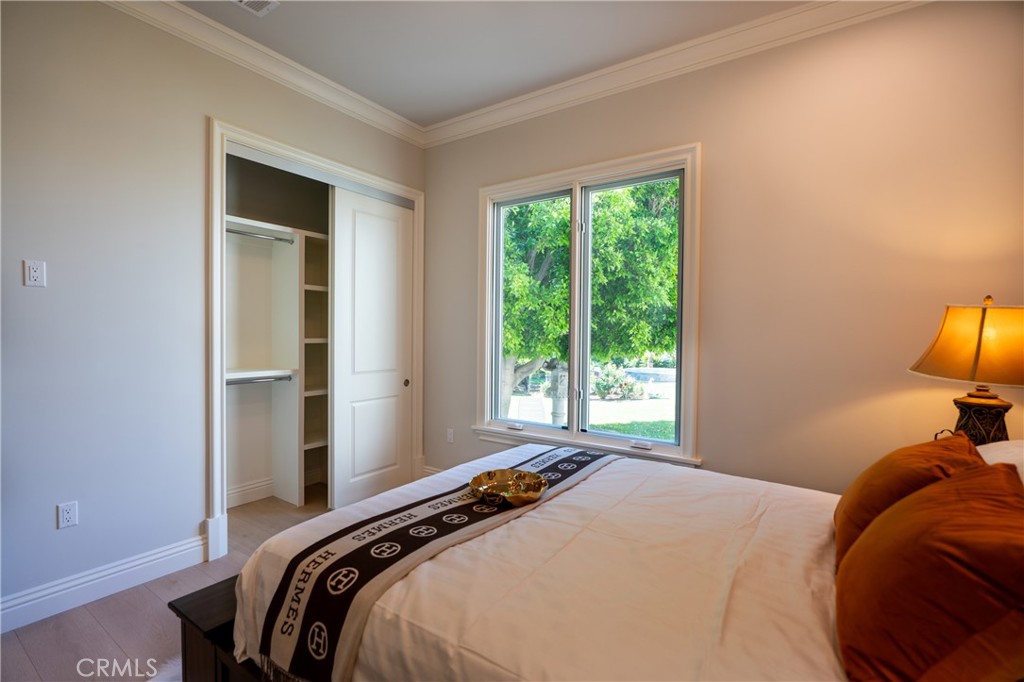 894 Fallen Leaf Road Arcadia, CA 91006 - Photo 14 of 28 a bedroom with a bed and a window