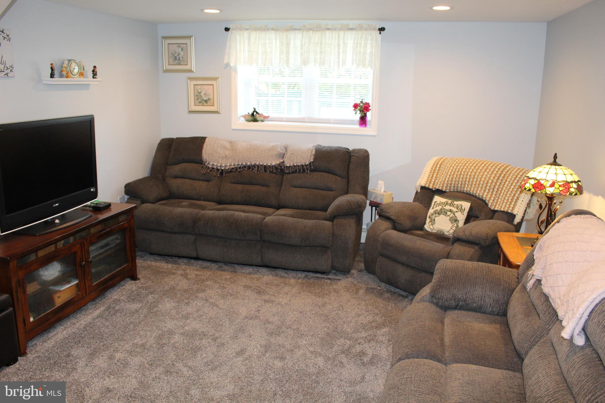 827 Phillips Road Warminster, PA 18974 - Photo 20 of 37 Family Room with New Carpeting