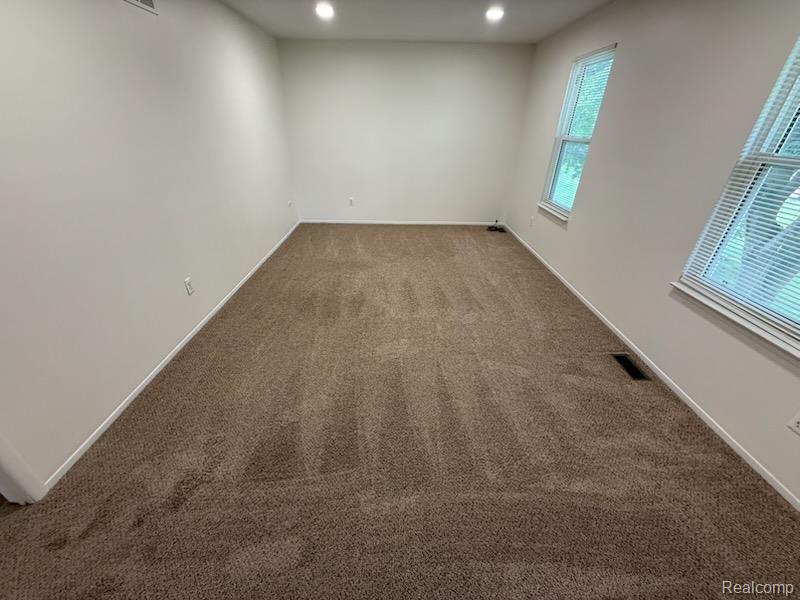 28144 Yorktown Road Farmington, MI 48331 - Photo 14 of 25 Room featuring light-colored walls and brown carpeting