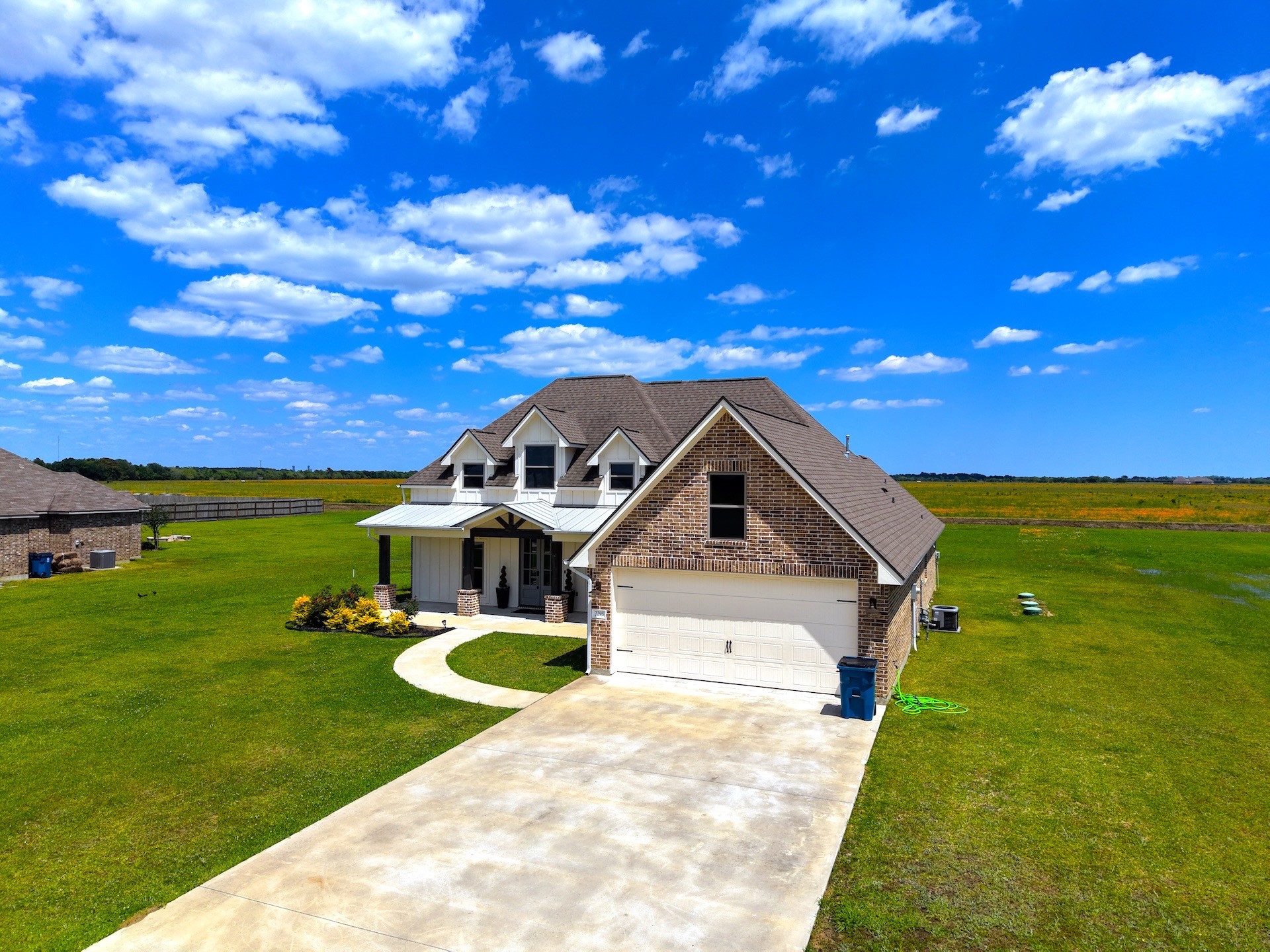 2295 Diamond D Lane Beaumont, TX 77713 - Photo 28 of 40 a front view of a house with a yard