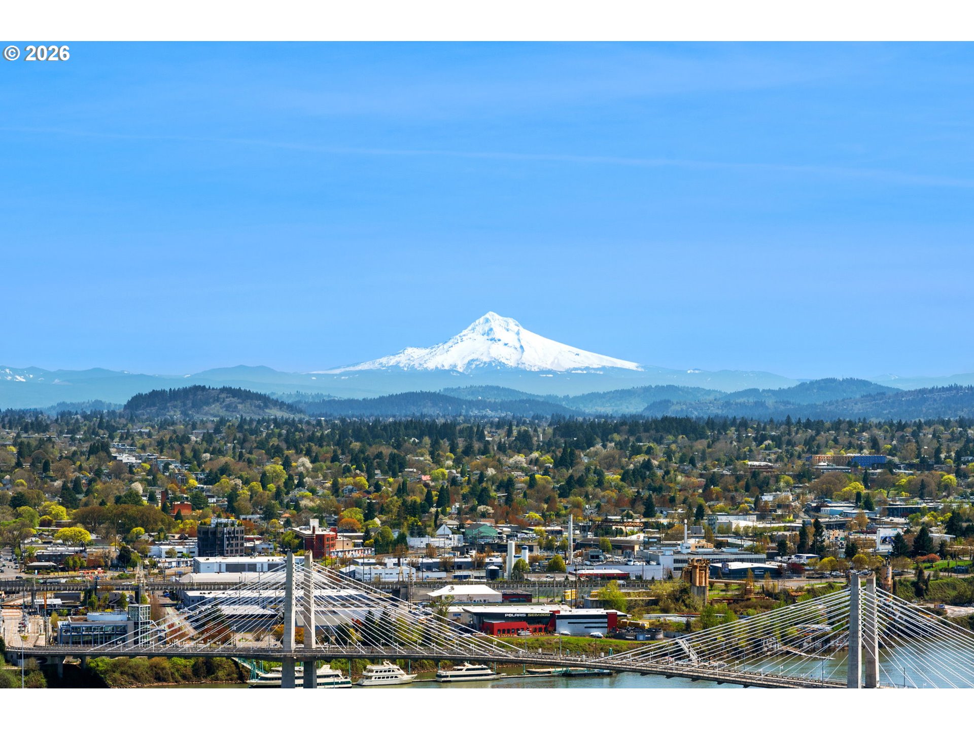 2211 Southwest 1st Avenue, Unit 1402 Portland, OR 97201 - Photo 15 of 48 a view of a city with mountains in the background