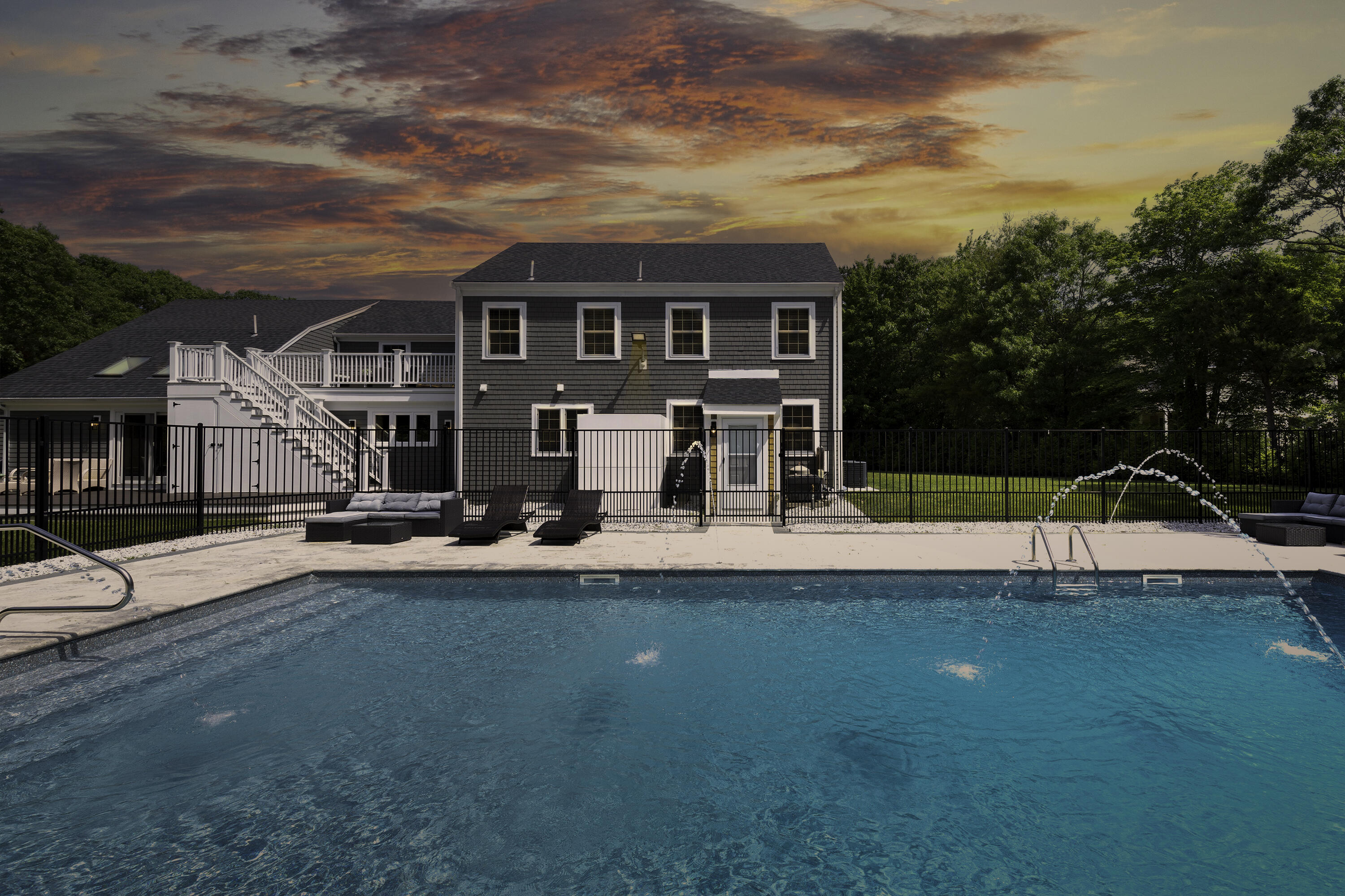 52 Boardley Road Sandwich, MA 02563 - Photo 12 of 100 a view of a house with swimming pool and porch