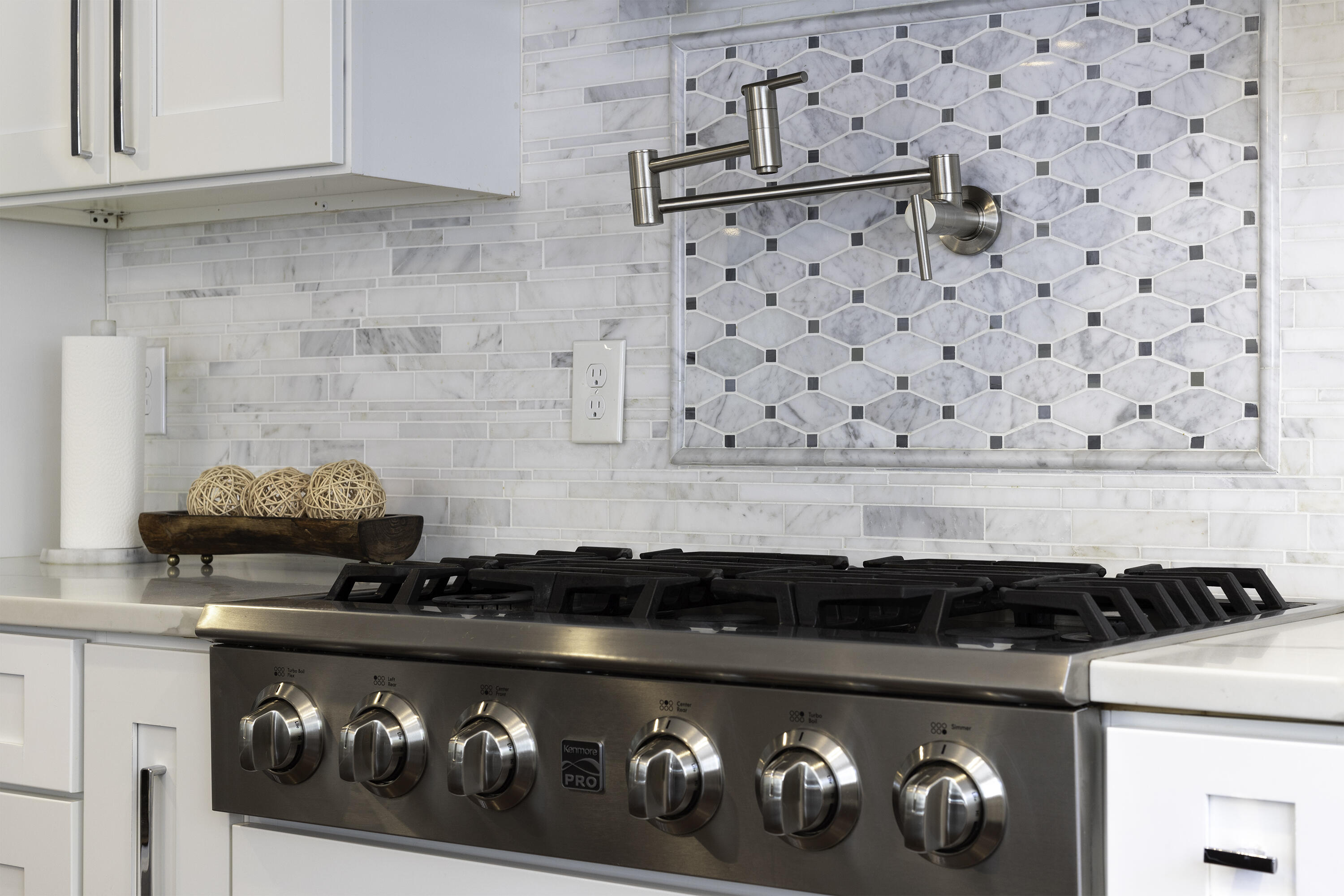 52 Boardley Road Sandwich, MA 02563 - Photo 28 of 100 a close view of a stove a microwave and cabinets