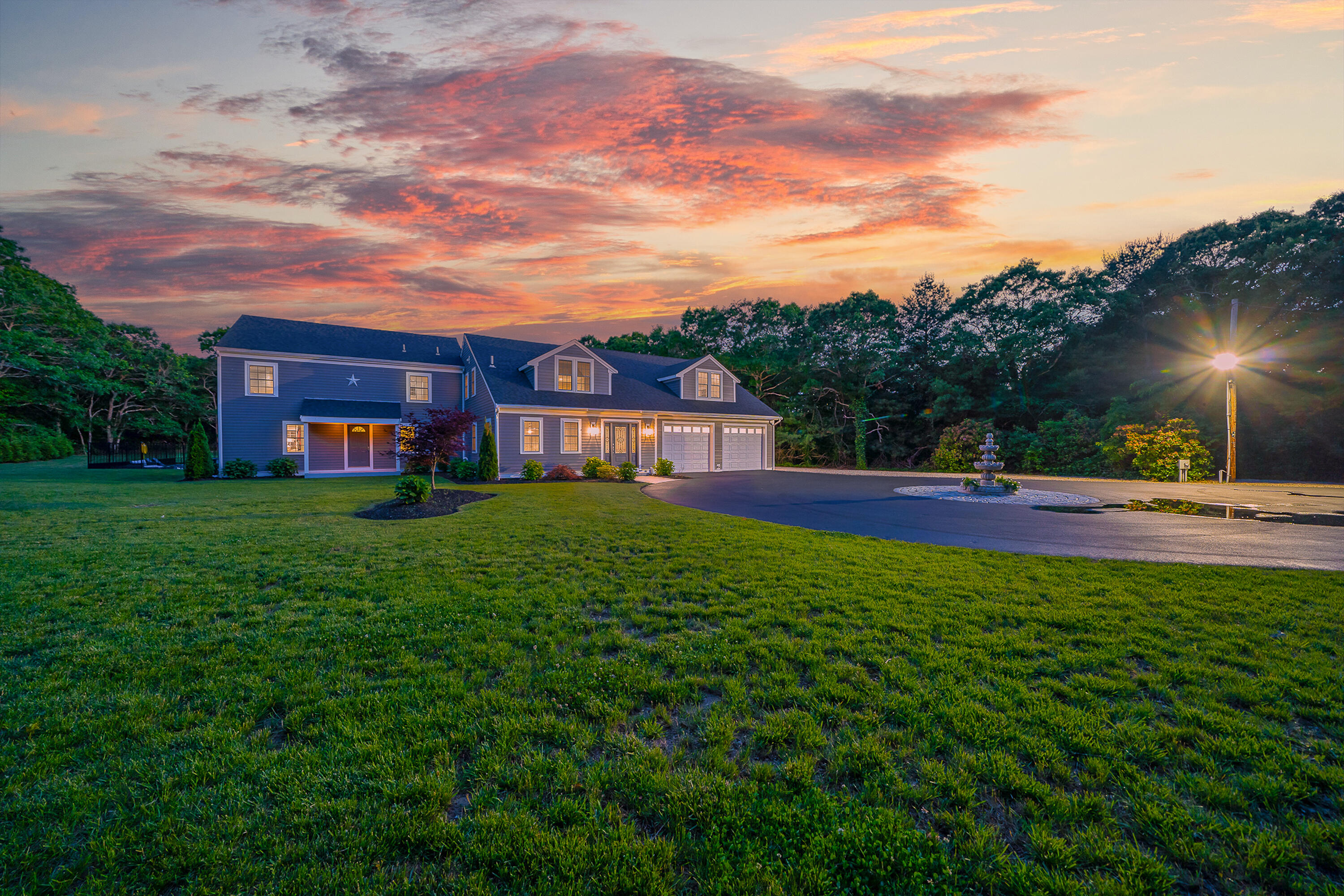 52 Boardley Road Sandwich, MA 02563 - Photo 5 of 100 a house view with a garden space