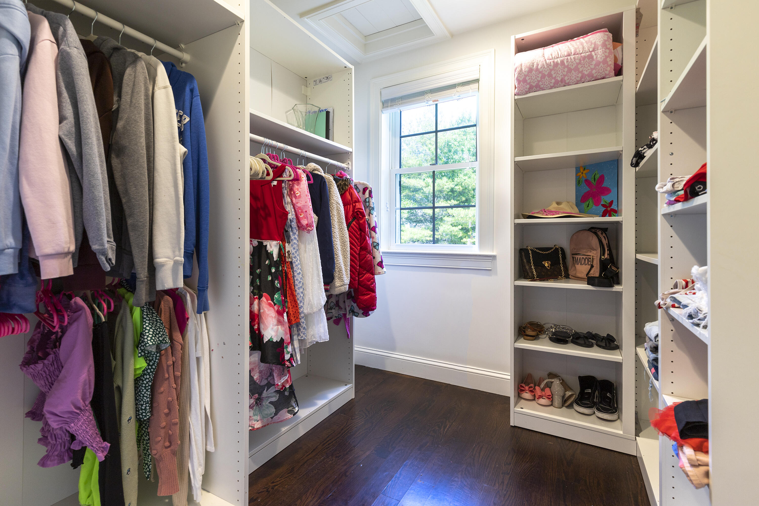 52 Boardley Road Sandwich, MA 02563 - Photo 66 of 100 a view of walk in closet with clothes and shoes