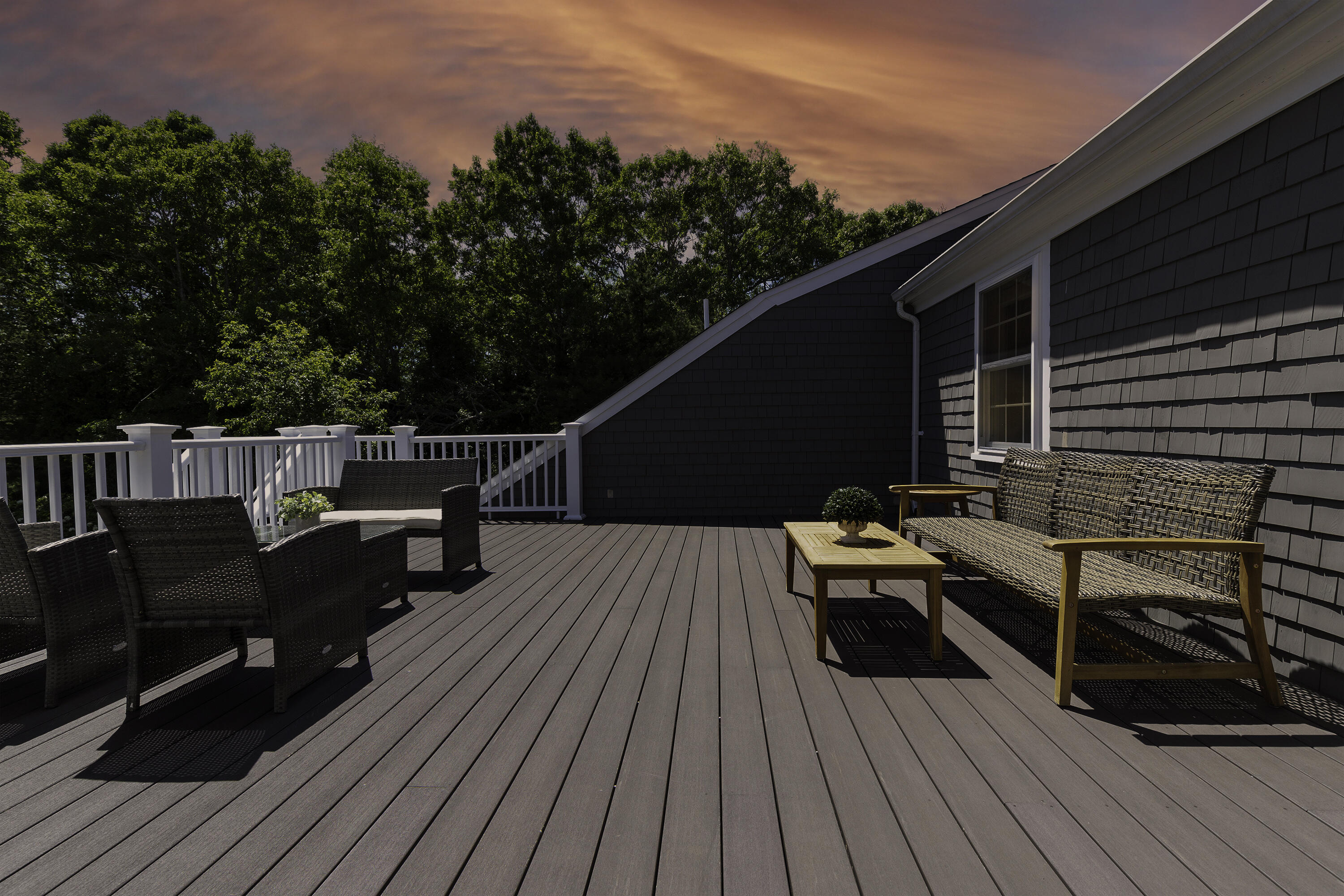 52 Boardley Road Sandwich, MA 02563 - Photo 70 of 100 a view of a roof deck with table and chairs with wooden floor and fence