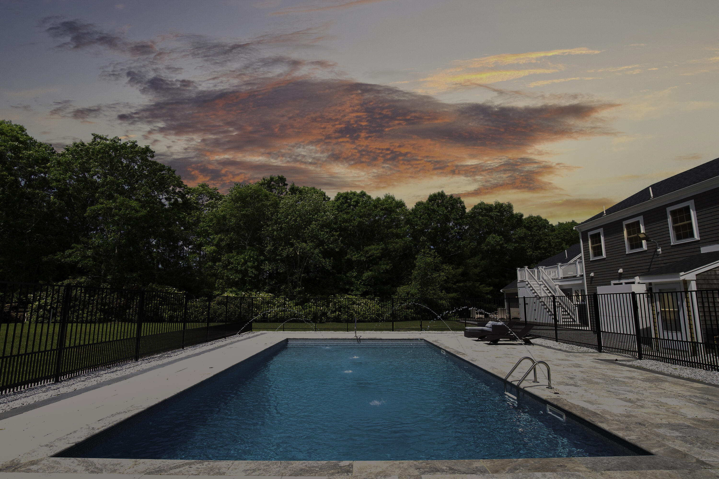 52 Boardley Road Sandwich, MA 02563 - Photo 7 of 100 a view of swimming pool with seating area and trees in the background