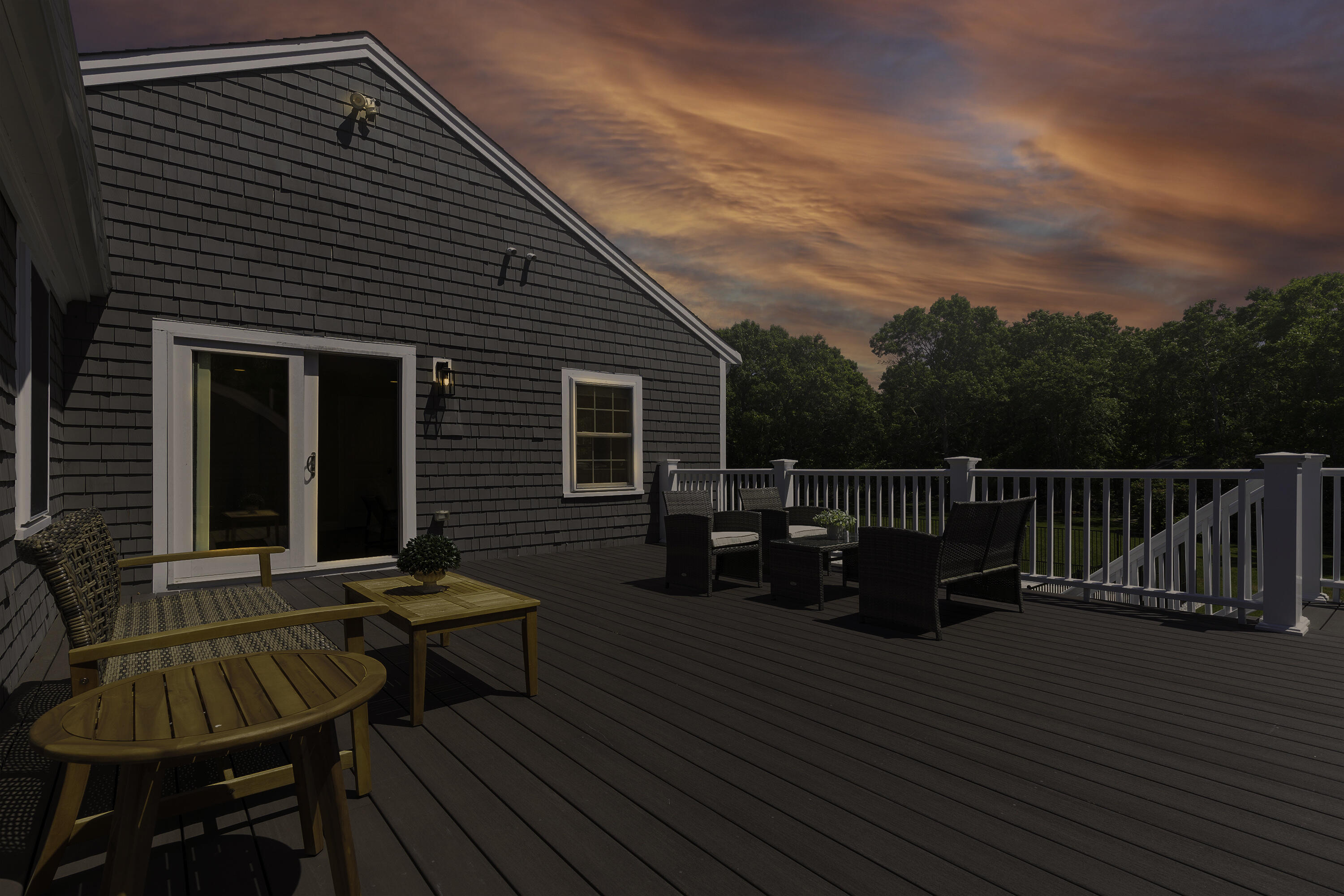 52 Boardley Road Sandwich, MA 02563 - Photo 71 of 100 a view of a roof deck with table and chairs with wooden floor and fence