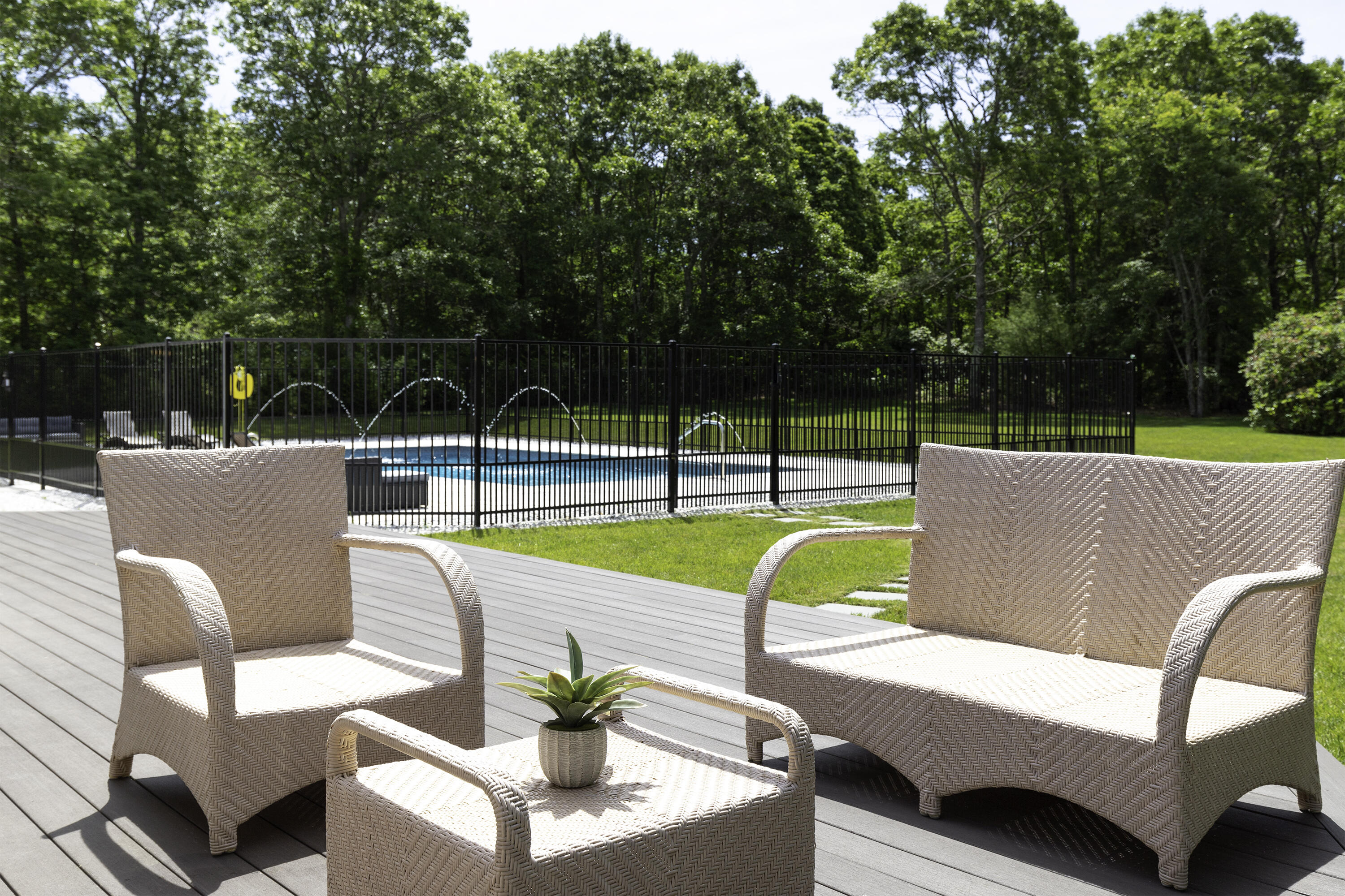 52 Boardley Road Sandwich, MA 02563 - Photo 88 of 100 a view of a swimming pool with a lounge chairs