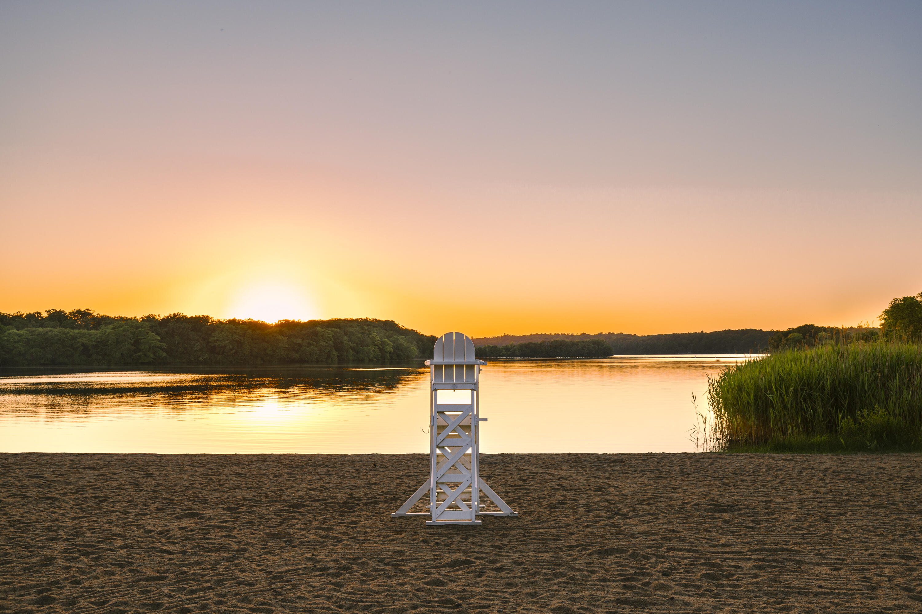 52 Boardley Road Sandwich, MA 02563 - Photo 100 of 100 a view of a lake with a mountain in the background