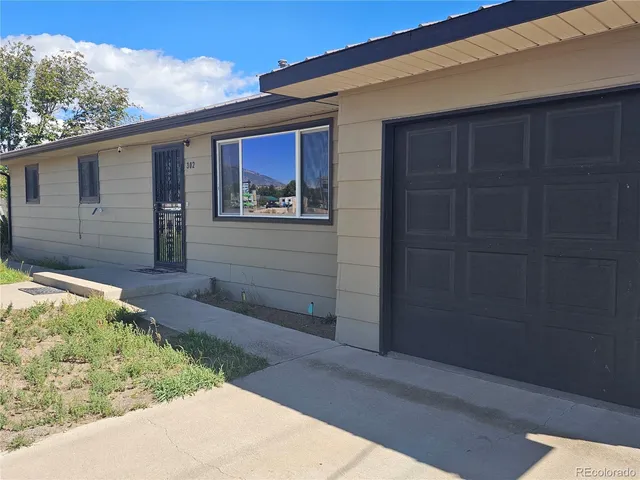 a house view with a backyard space