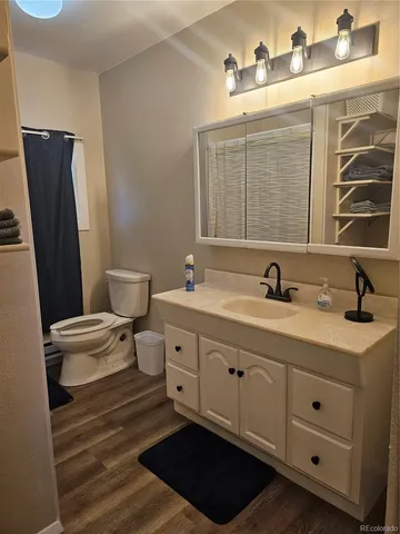 a bathroom with a double vanity sink and mirror