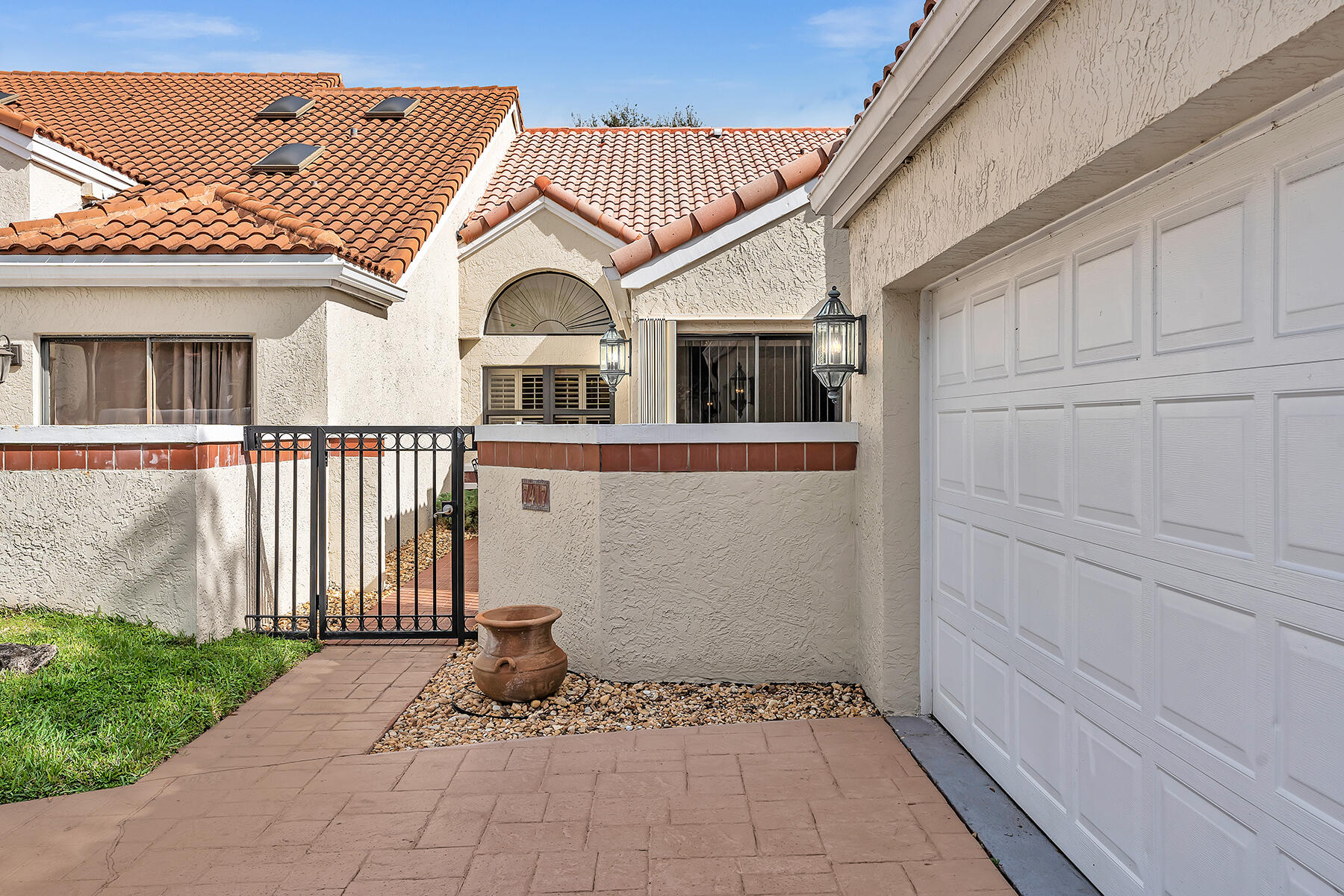 7417 Campo Florido Boca Raton, FL 33433 - Photo 6 of 74 Front Exterior