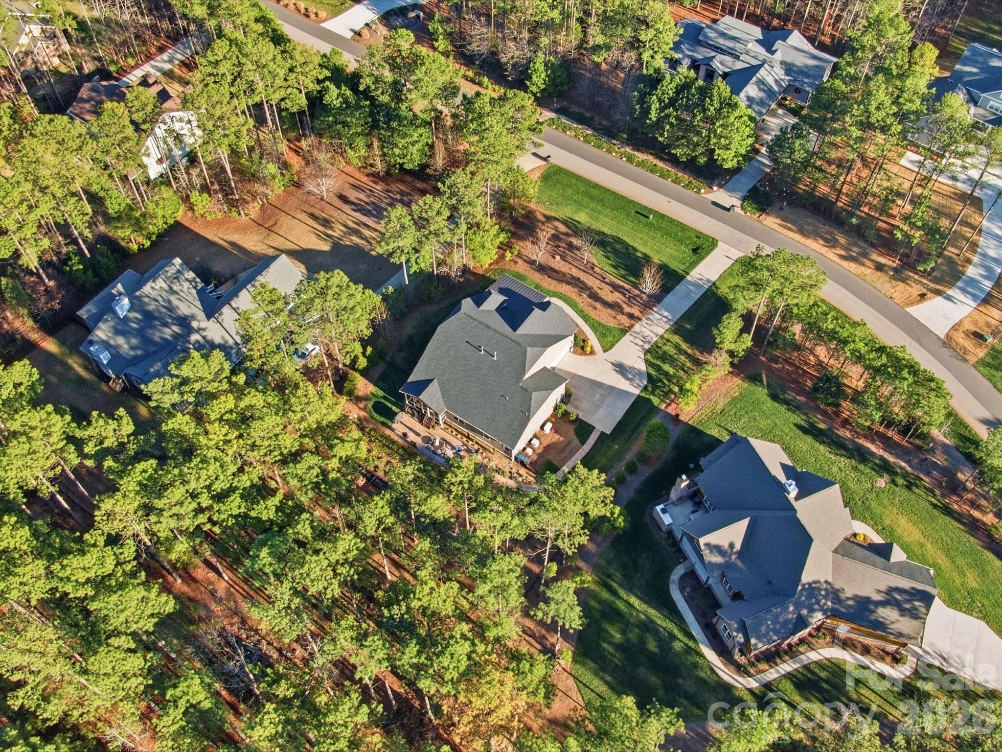 4166 Persimmon Road Lancaster, SC 29720 - Photo 38 of 41 an aerial view of a house with a yard and garden