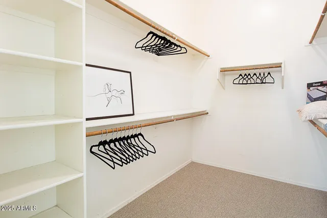 a view of a hallway with stairs