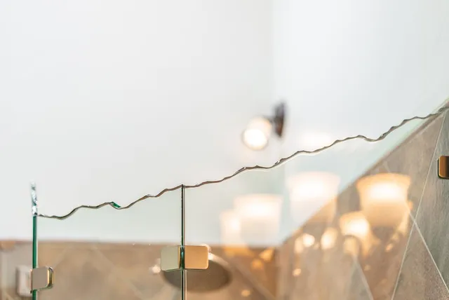 a view of a hallway with stairs