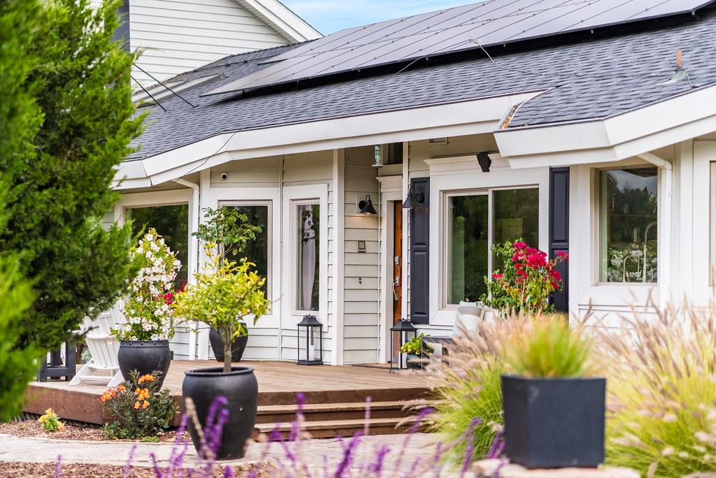 1501 Hidden Valley Road Soquel, CA 95073 - Photo 3 of 61 a front view of a house with plants