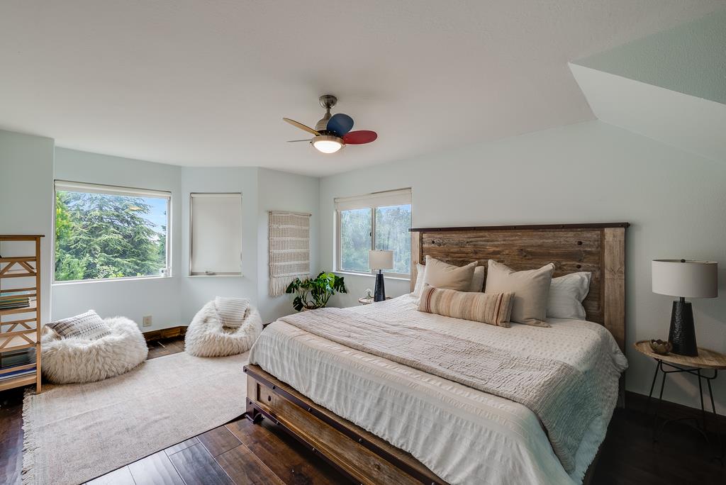 1501 Hidden Valley Road Soquel, CA 95073 - Photo 31 of 61 a bedroom with bed and a window