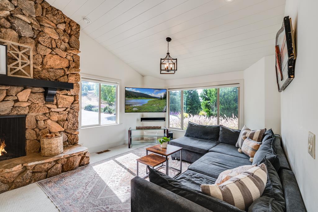 1501 Hidden Valley Road Soquel, CA 95073 - Photo 40 of 61 a living room with furniture and a fireplace