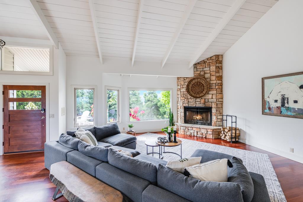 1501 Hidden Valley Road Soquel, CA 95073 - Photo 4 of 61 a living room with furniture and a fireplace