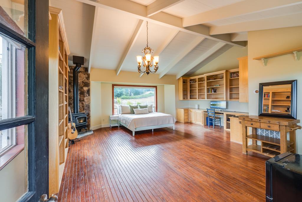 1501 Hidden Valley Road Soquel, CA 95073 - Photo 46 of 61 a living room with furniture and a wooden floor