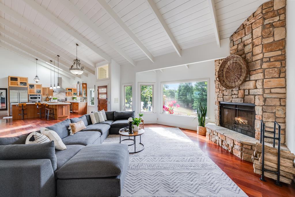 1501 Hidden Valley Road Soquel, CA 95073 - Photo 5 of 61 a living room with furniture and a fireplace