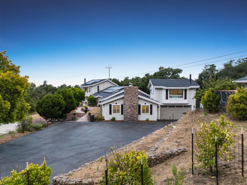 1501 Hidden Valley Road Soquel, CA 95073 - Photo 57 of 61 a front view of a house with a yard and mountain view