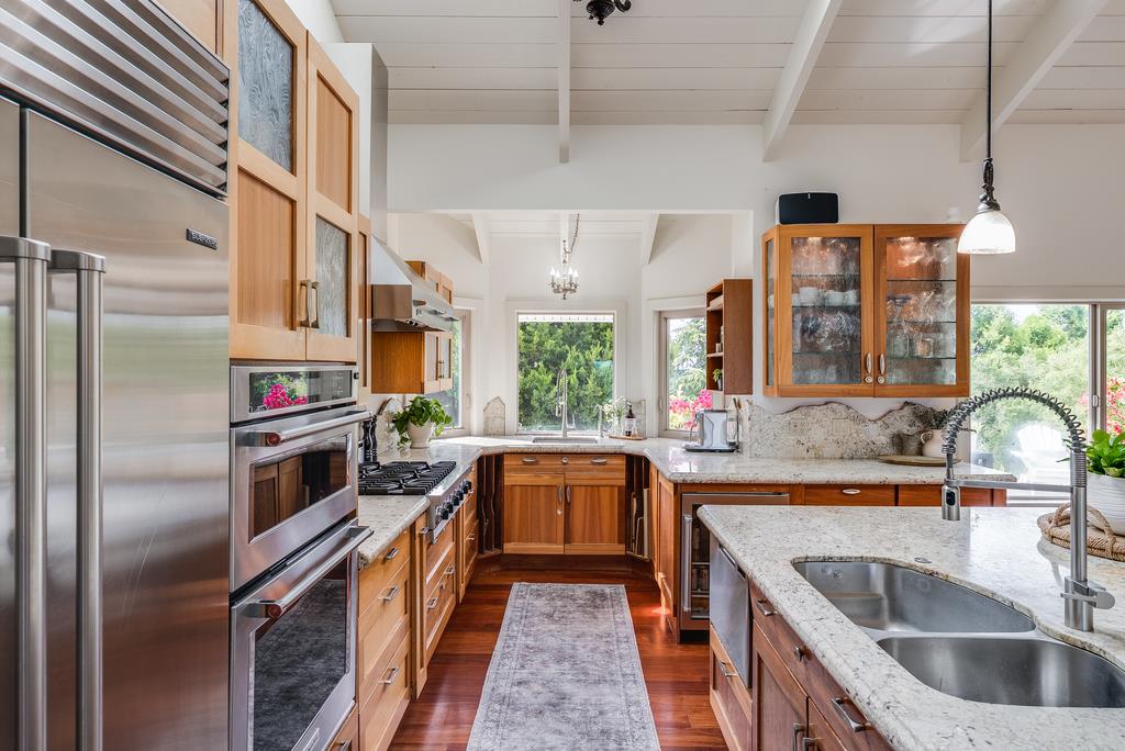1501 Hidden Valley Road Soquel, CA 95073 - Photo 9 of 61 a kitchen that has a sink and a stove