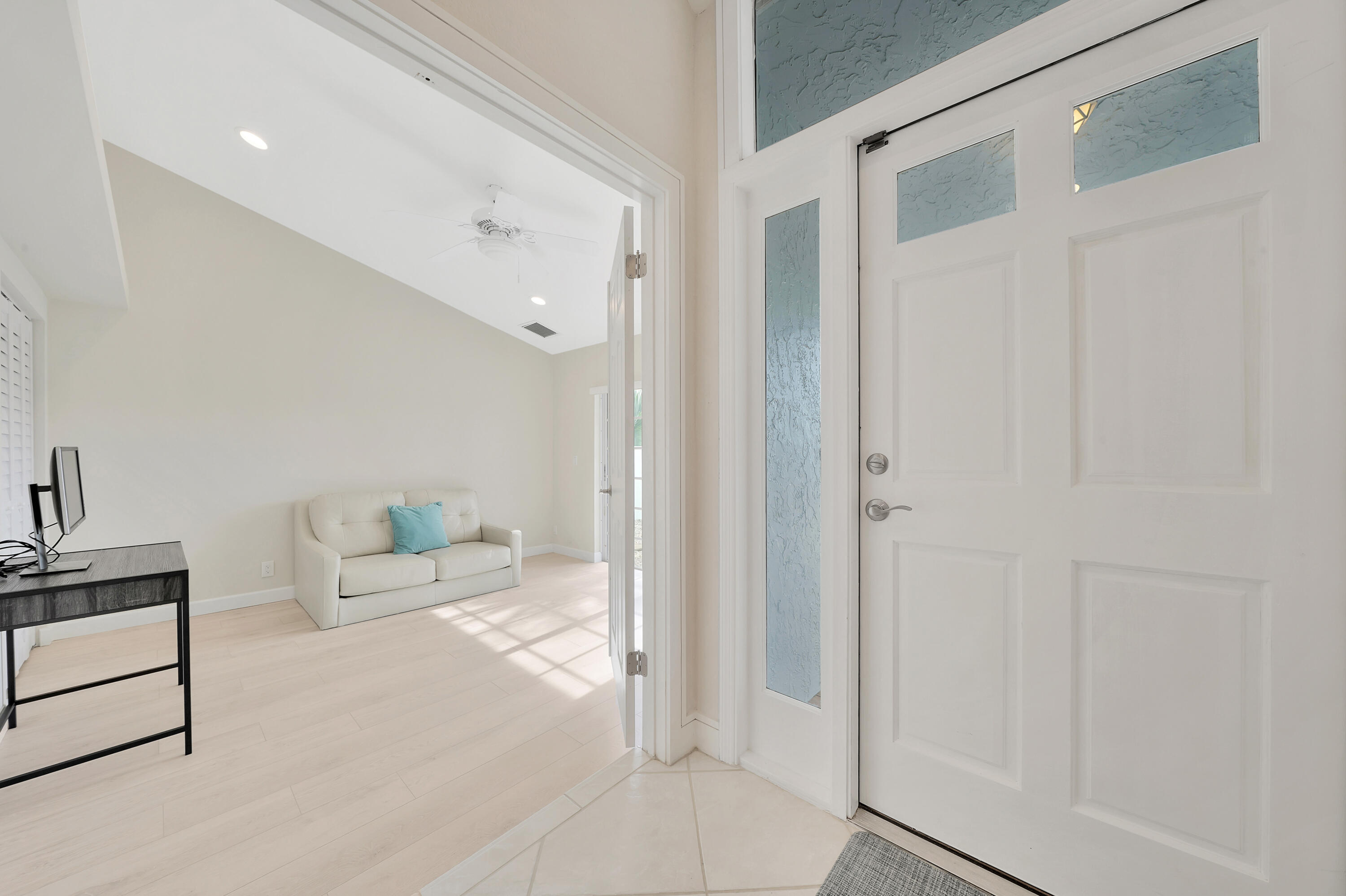 2475 Northwest 25th Street Boca Raton, FL 33431 - Photo 23 of 72 a living room with furniture and a walk in closet