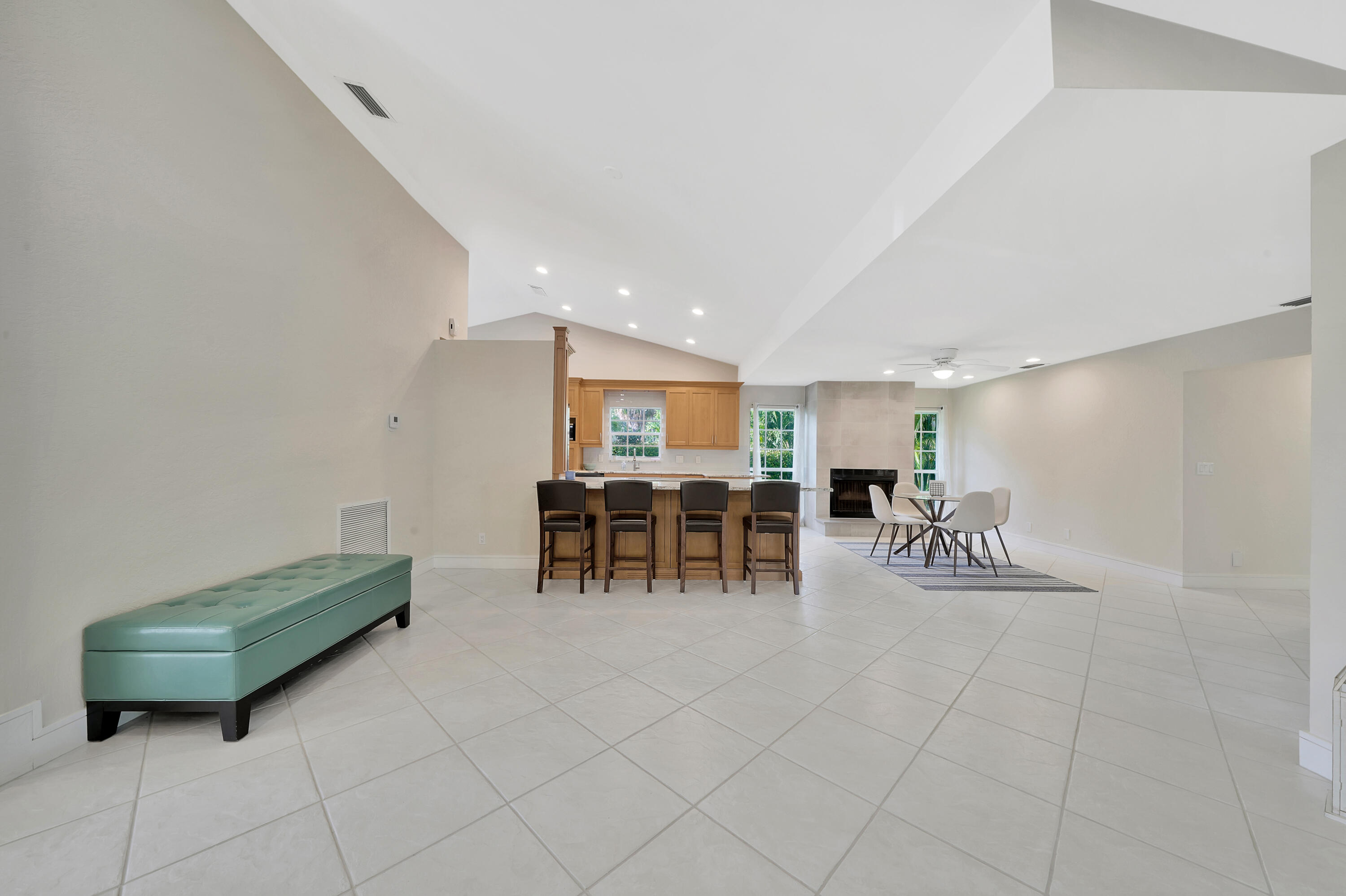 2475 Northwest 25th Street Boca Raton, FL 33431 - Photo 26 of 72 a living room with furniture and a table