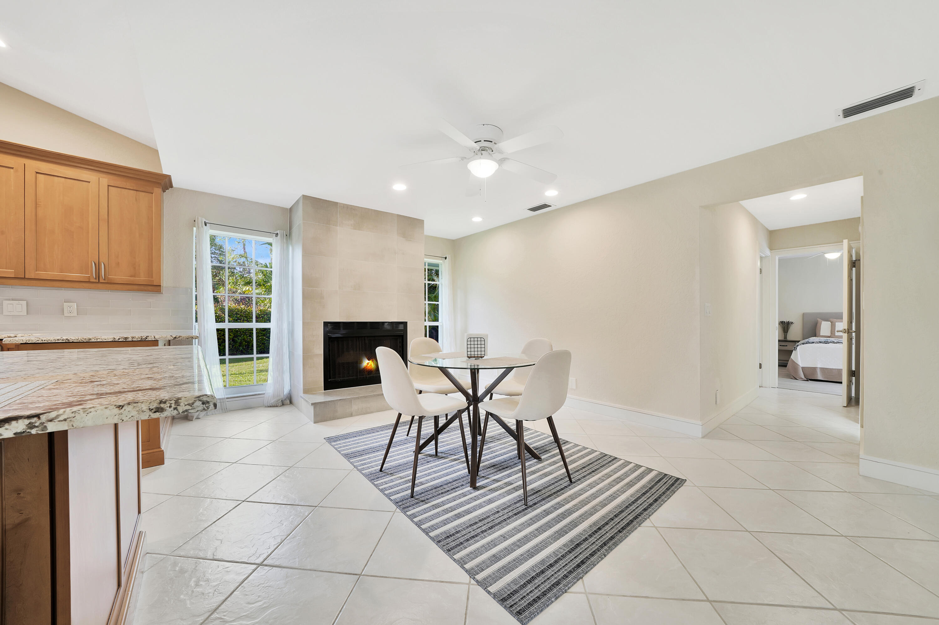2475 Northwest 25th Street Boca Raton, FL 33431 - Photo 35 of 72 a view of a livingroom with furniture and a dining table